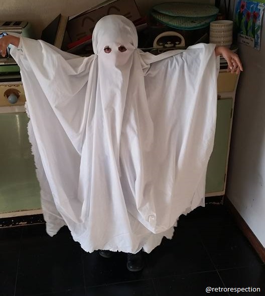 Bed sheet ghost costume