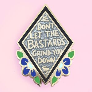 Jubly Umph Lapel Pin - Don't Let The Bastards Grind You Down 